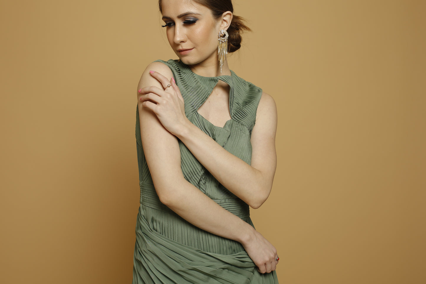Sleeveless pleated gown