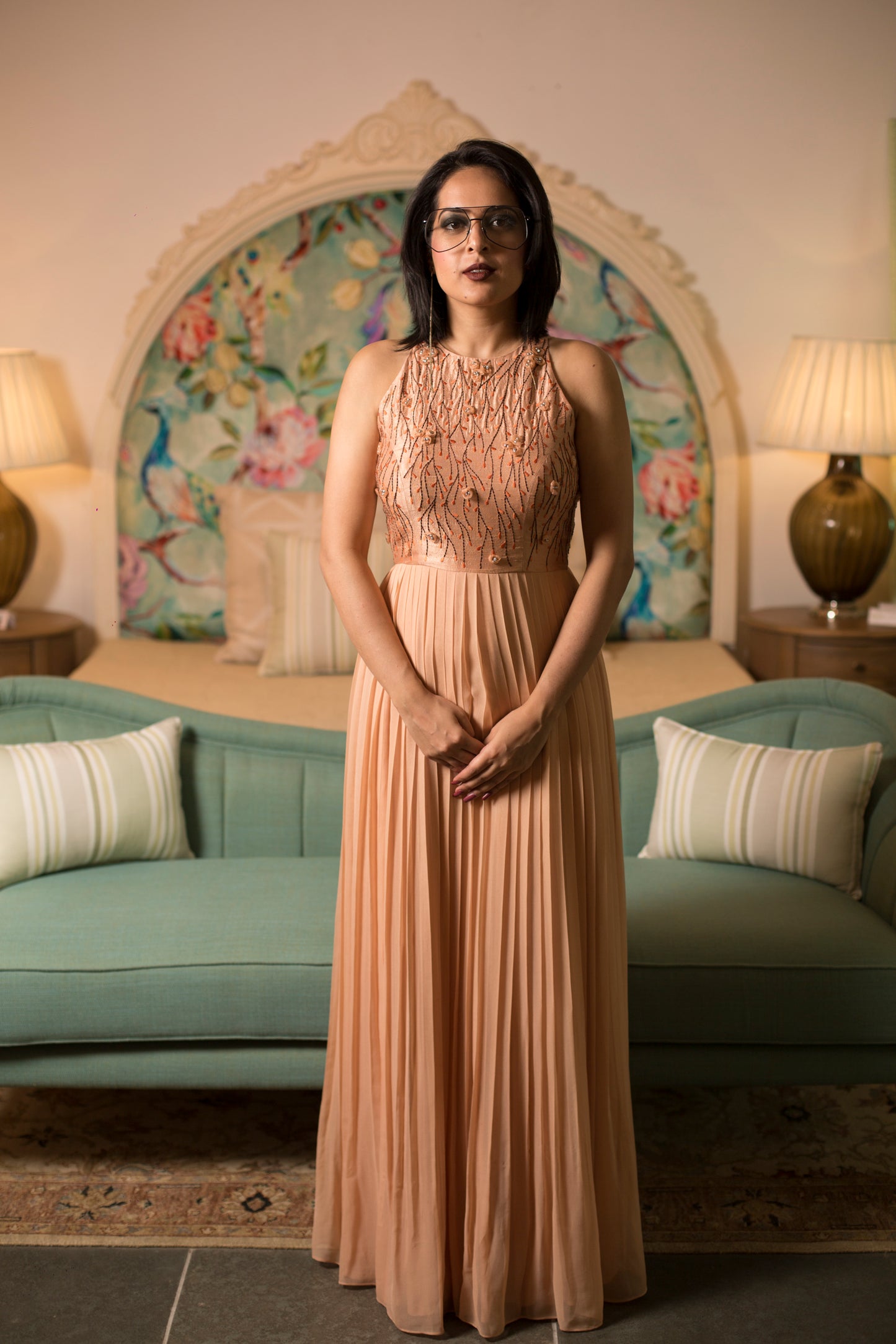 Embroidered pleated gown