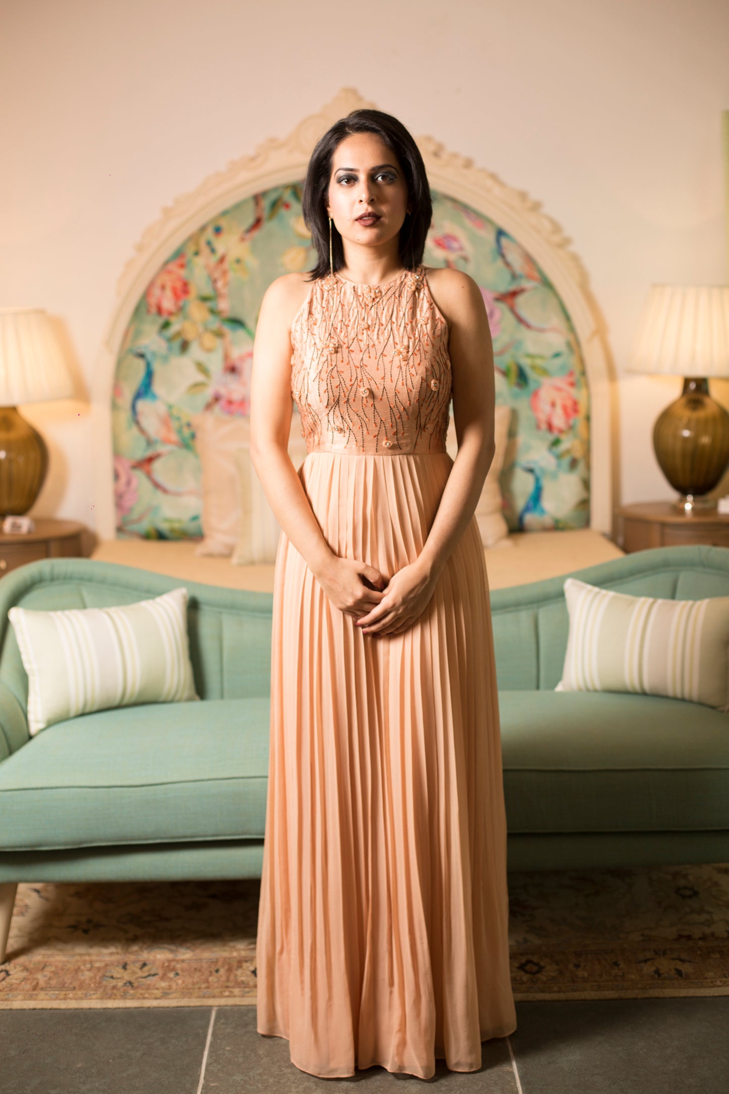 Embroidered pleated gown