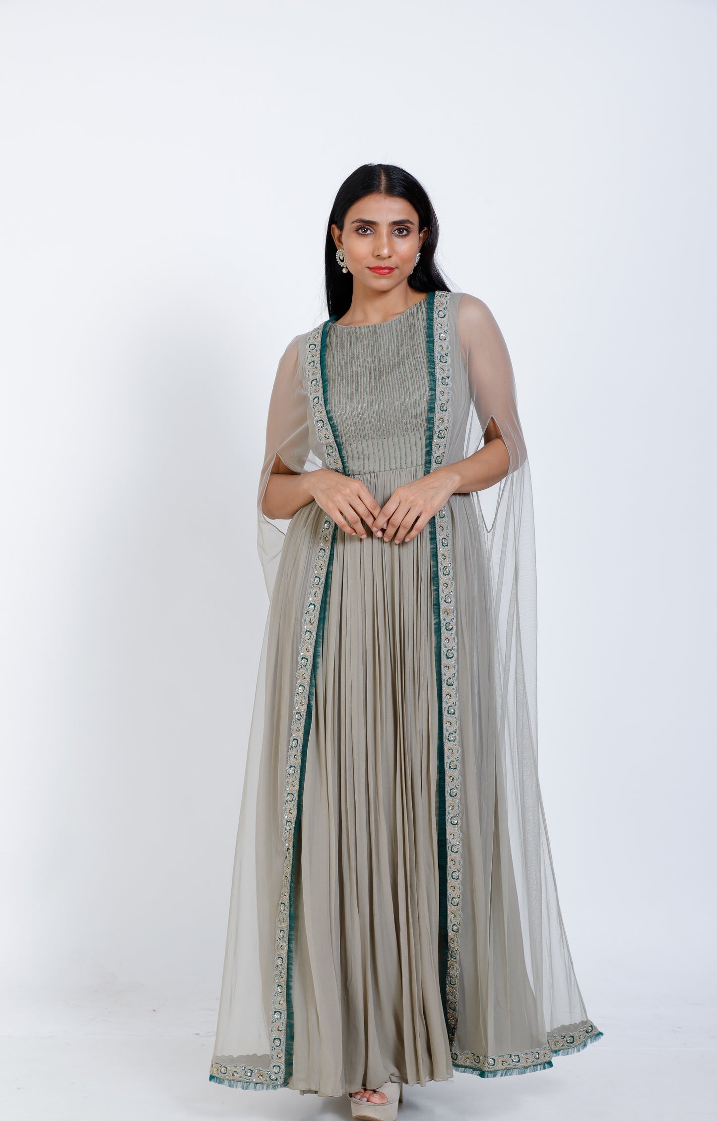 Embroidered cape style gown