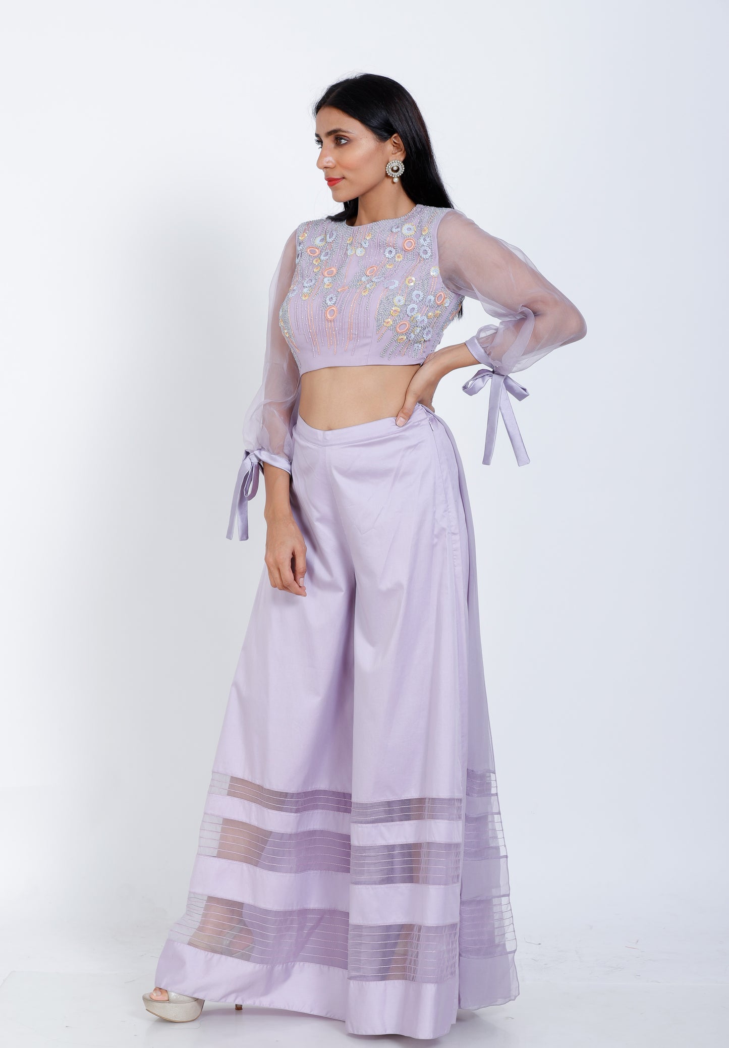 Embroidered top with flared pants